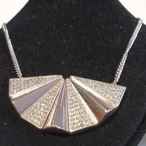 mark. Elegant Silver Fan Cub Pendant Necklace